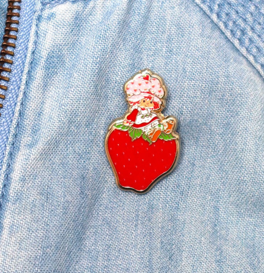 Sitting on a Strawberry Enamel Pin